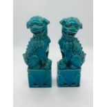 A pair of turquoise Chinese Foo dogs standing approx. 20cm tall