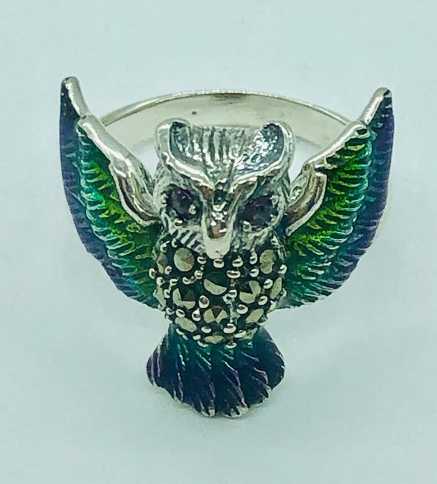 A silver and plique a jour ring in the form of an owl