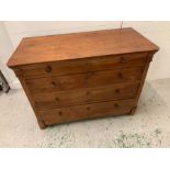 A side board with smaller top drawer and three further drawers below