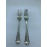 A Pair of silver forks dated London 1817 by William Eleya and William Fearn