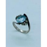 Antique aquamarine ring with diamond shoulders core (one diamond missing)