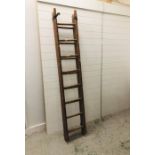 A Pair of extendable wooden ladders