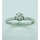 An 18ct white gold single stone diamond ring of 30 points approx.