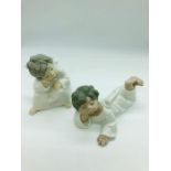 A pair of Lladro figures of Angels.