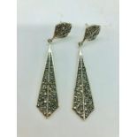 A pair of silver and marcasite art deco style drop earrings