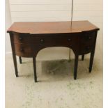 A Large break front Georgian mahogany serving sideboard with a cellarette