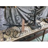 A Pair of wrought iron decorative pillar tops