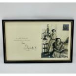 A Christmas Card signed Elizabeth R featuring a photograph of Princess Margaret and the Queen