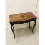 A Console table with slender serpentine outline and marquetry top AF