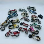 Selection of diecast toy motorbikes and push bikes