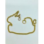 A 9ct yellow gold Albert chain (27.4g)