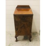 A Small hallway cabinet on cabriole legs