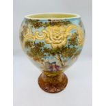 A hand painted vase with neo classical scene
