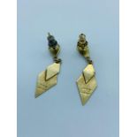 A pair of three colour gold earrings (marked 585)