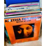 A large selection of vinyl records to include Aretha Franklin, Fats Waller, Elvis, Jo Jo Gunne and