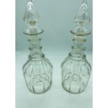 A pair of vintage glass decanters