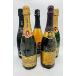 A selection of five sparkling wines and champagnes to include a 1982 Veuve Clicquot Ponsardin