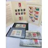A selection of stamp sets from Accession of King George V. Two sets of German stamps in presentation