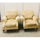 A pair of Howard style armchairs on castors by Duresta
