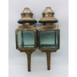 A Pair of Vintage brass carriage lamps.