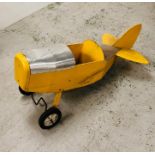 A yellow metal child's sit in plane (approx. 130cm long)