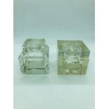 Two glass inkwells of square form