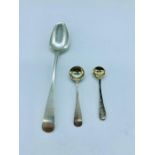 A silver teaspoon and two silver mustard spoons