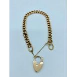 A 9ct rose gold bracelet with heart padlock (28g)