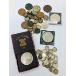 A selection of coins of various denominations, years and conditions.