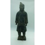 A Chinese clay figure of a man