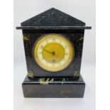 A slate mantel clock AF