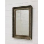 A wooden painted mirror