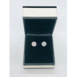 A pair of silver substantial cz stud earrings of 4ct's approx.