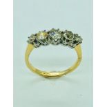 An 18ct yellow gold five stone diamond ring of 1.35cts