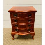 A mahogany four drawer bedside table (H59cm W43cm D35cm)