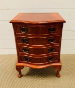 A mahogany four drawer bedside table (H59cm W43cm D35cm)