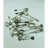 A volume of hallmarked silver to include a variety of spoons and some scrap silver.