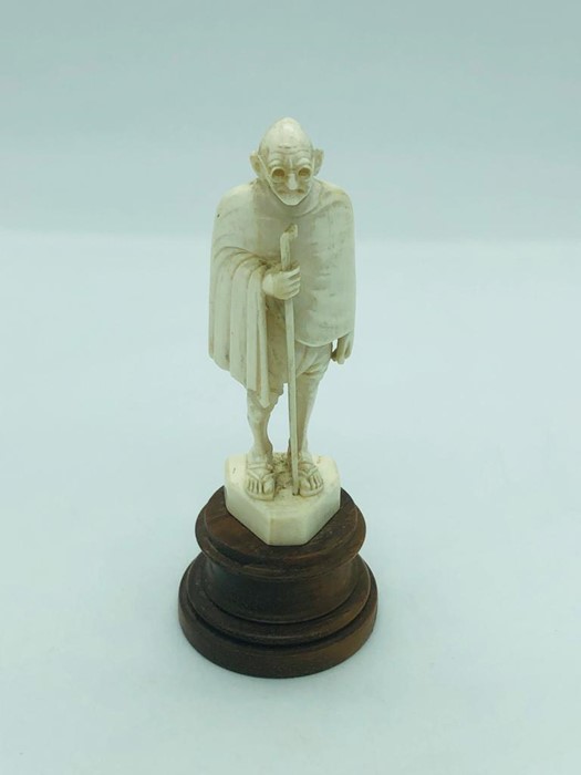 An Antique Indian carved ivory figure of Mahatma Gandhi.