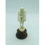 An Antique Indian carved ivory figure of Mahatma Gandhi.