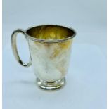 A small silver cup, hallmarked Birmingham 1934-35