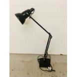 A black angle poise desk lamp by Herbert Terry and Sons ltd