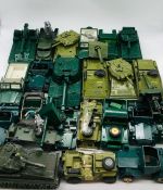 A selection of twenty six Britain's die cast military vehicles