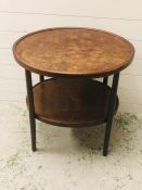 An Oval two tier table with bentwood legs in art and crafts style