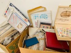 A large box of mixed stamps, some in albums and some loose