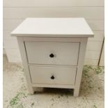 A small two drawer bedroom cabinet