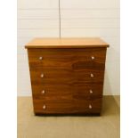 A wood effect chest of drawers