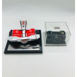 Mercedes racing promotional items to include a Vodaphone MP4-22A nose cone AF and a miniature