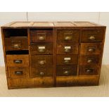 Two solid oak shop fitting/ filing cabinets with brass pull handles(H84cm D57cm W62cm)