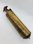 A Vintage Pyrene Fire Extinguisher in brass.