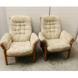 A Pair of mid century Ercol easy chairs